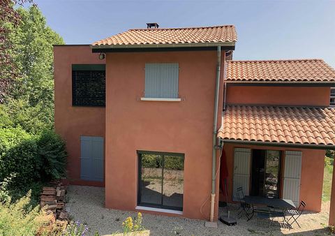 Façade côté jardin avec grande baie au rez-de-chaussée